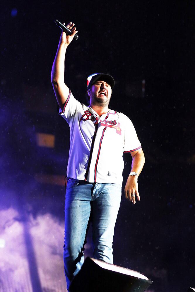 Luke Bryan rocked rainy and sold out Truist Park on Saturday, August 17, 2024 on his Mind of a Country Boy Tour. His support acts were Bailey Zimmerman, Kameron Marlowe and American Idol winner Chayce Beckham. 
Robb Cohen for the Atlanta Journal-Constitution