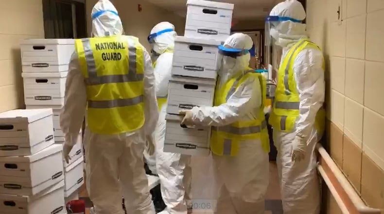 The Georgia National Guard was sent to help decontaminate Pelham Parkway Nursing Home, where at least 20 patients are known to have been infected with the coronavirus. Gov. Kemp posted this photo on Twitter.