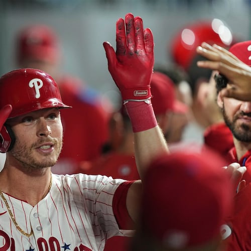 FILE - Philadelphia Phillies' Max Kepler celebrates after hitting a home run off of New York Mets pitcher Ryan Helsley during the eighth inning of a baseball game, on Sept. 10, 2025, in Philadelphia. (AP Photo/Matt Rourke, File)