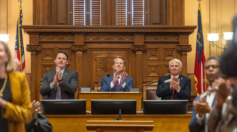 Georgia Lt. Gov. Burt Jones, left, leader of the Senate, Gov. Brian Kemp, middle, and House Speaker Jon Burns will play key roles in debating a possible deal on health care in 2024.  (PHOTO by Arvin Temkar/The Atlanta Journal-Constitution/TNS)