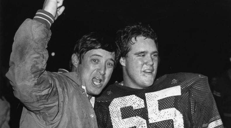 Former Brookwood High School football coach Dave Hunter (left). AJC file photo