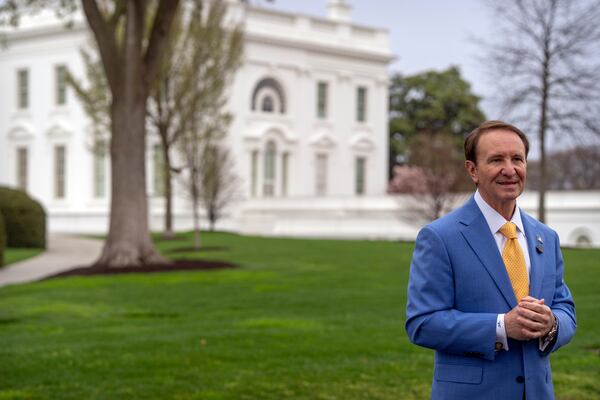 Louisiana Gov. Jeff Landry records a social media video outside the White House, Monday, March 24, 2025, in Washington. (AP Photo/Mark Schiefelbein)