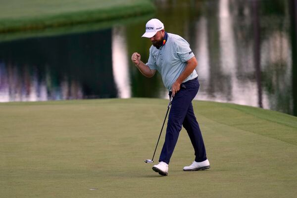 Shane Lowry, of Ireland, reacts after making a putt on the 16th hole during the third round at the Masters golf tournament, Saturday, April 12, 2025, in Augusta, Ga. (AP Photo/George Walker IV)