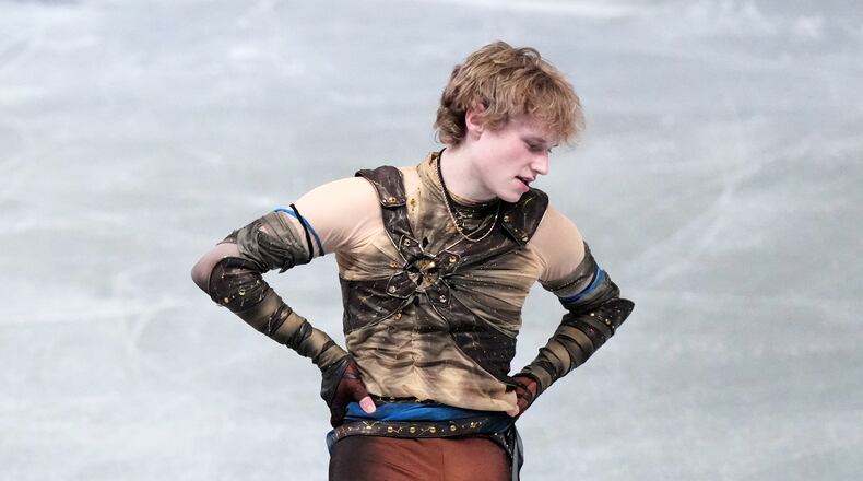 Ilia Malinin, of the United States, reacts after finishing the men's short program segment at the ISU Grand Prix of Figure Skating Final in Nagoya, central Japan, Thursday, Dec. 4, 2025. (AP Photo/Hiro Komae)