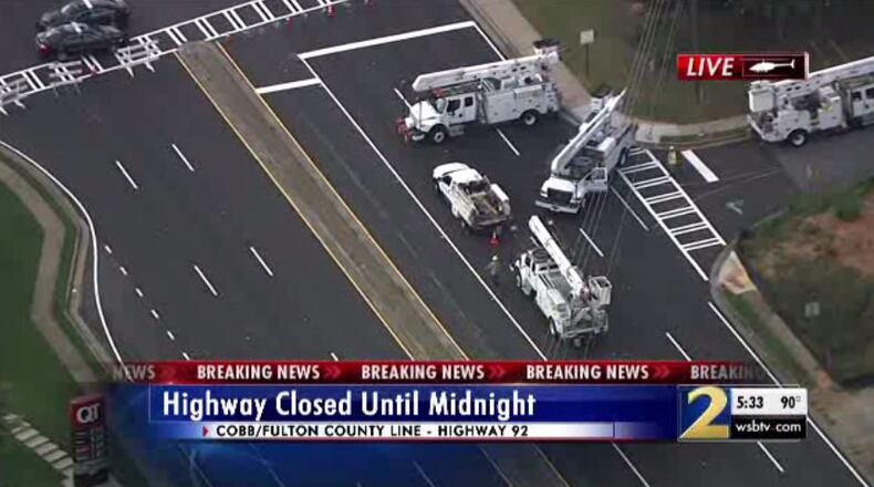 A rear-end collision caused a road closure in Roswell.