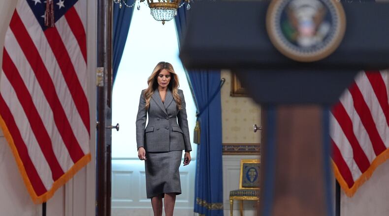 First lady Melania Trump arrives to speak with reporters Thursday, April 9, 2026, in the Grand Foyer of the White House in Washington. (AP Photo/Jacquelyn Martin)