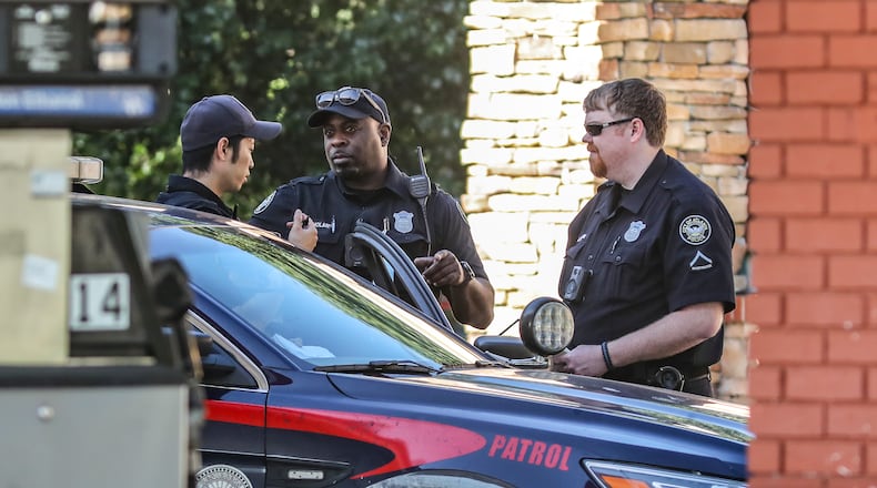 May 17, 2022 Atlanta: Atlanta police responded to a shooting call at the Exxon station located at 3843 Jonesboro Rd SE in Atlanta about 9 am. Crime scene investigators processed the scene there. No further details were provided by the police at the scene. (John Spink / John.Spink@ajc.com)