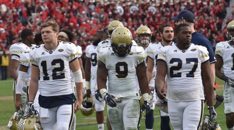 November 25, 2017 Atlanta - Georgia Tech players leave after Georgia defeat Georgia Tech 38-7 during an NCAA college football game at Bobby Dodd Stadium on Saturday, November 25, 2017. HYOSUB SHIN / HSHIN@AJC.COM