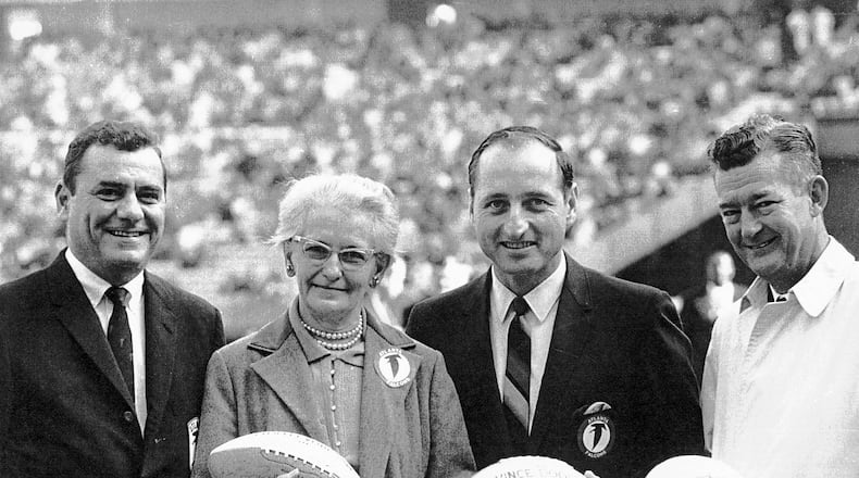 Then-Falcons owner Rankin Smith, Julia Elliott, then-Georgia coach Vince Dooley and then-Atlanta Constitution sports editor Jesse Outlar before a game in 1966. Elliott, a school teacher in Griffin, suggested Falcons as the team’s nickname.