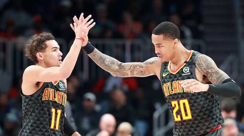 Hawks' Trae Young and John Collins would be strong candidates to play in an All-Star Game in Atlanta.  Curtis Compton / ccompton@ajc.com