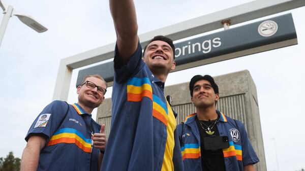 Matthew Plese, Joabe Barbosa and Omar Yousaf at the North Springs station before their record attempt. 