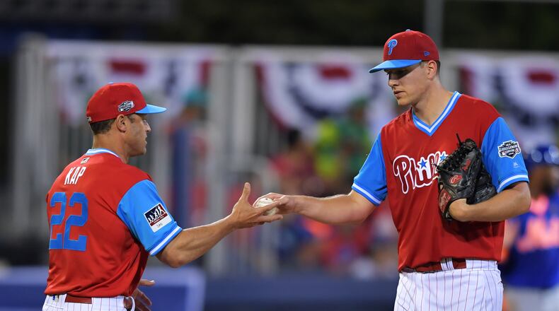 A good sign for Braves fans: Philadelphia starter Nick Pivetta handing the ball over to his manager in just the fourth inning against the Mets. (Drew Hallowell/Getty Images)