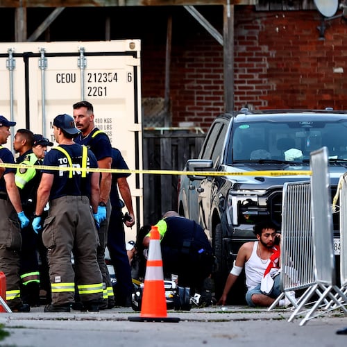 Paramedics respond to an active shooter at the Salsa on St. Clair event in Toronto, Saturday, July 11, 2026. (Keito Newman/The Canadian Press via AP)