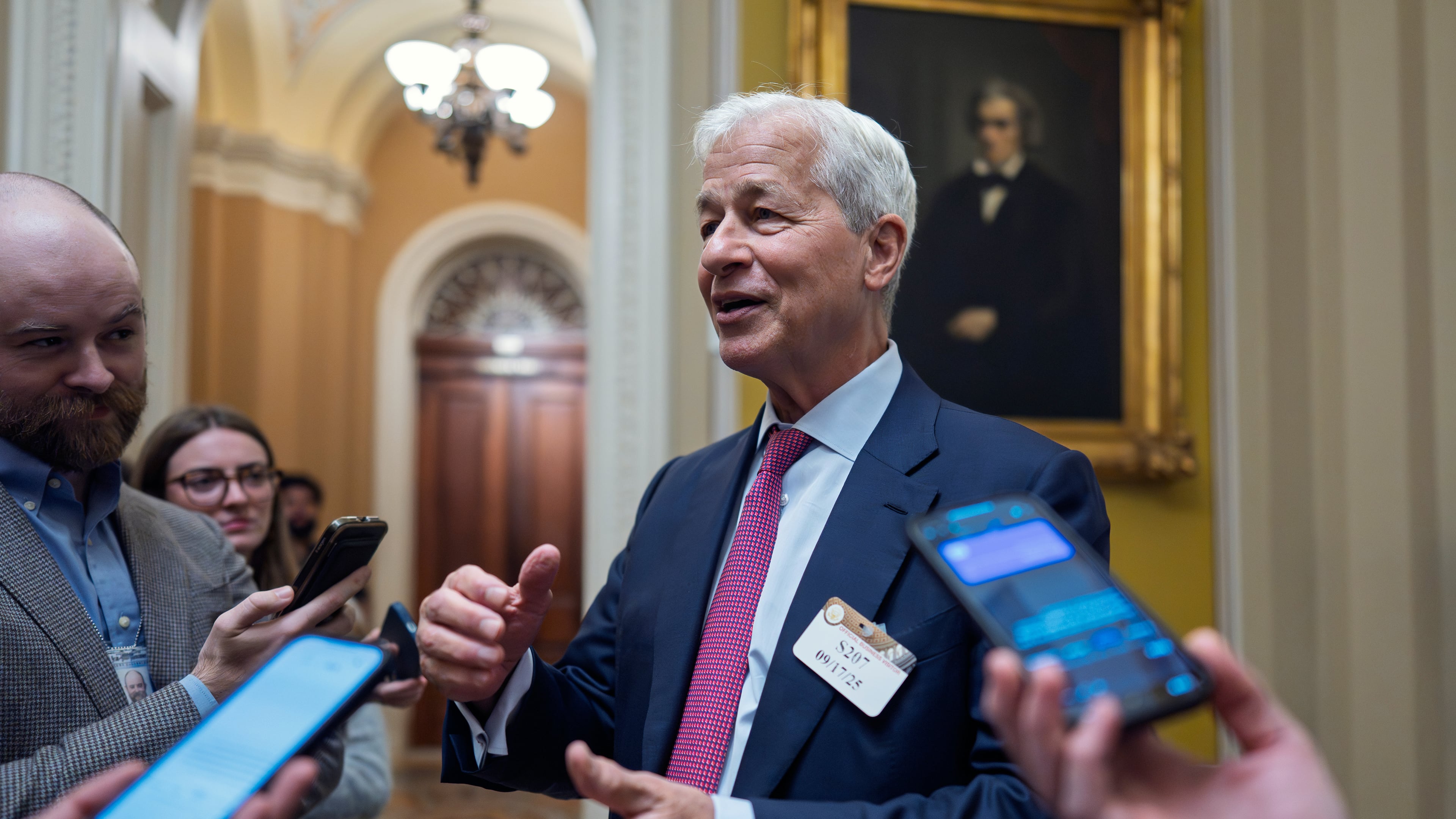 Jamie Dimon, CEO and chairman of JPMorgan Chase, pauses to talk to reporters after lunch with Republican senators to discuss the economy, at the Capitol in Washington, Wednesday, Sept. 17, 2025. (AP Photo/J. Scott Applewhite)