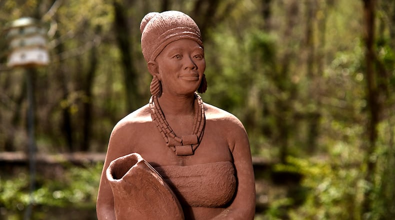 “Reception,” by Nigerian artist Fred Ajanogha, fulfills a Nigerian tradition that visitors should be welcomed by the most beautiful woman within the house and offered a gift. Reception is a stone cast sculpture of an African woman, dressed in traditional attire, holding a drinking gourd. ROSWELL ARTS FUND