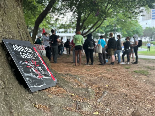 Protesters got together near Georgia State University campus Saturday evening. 