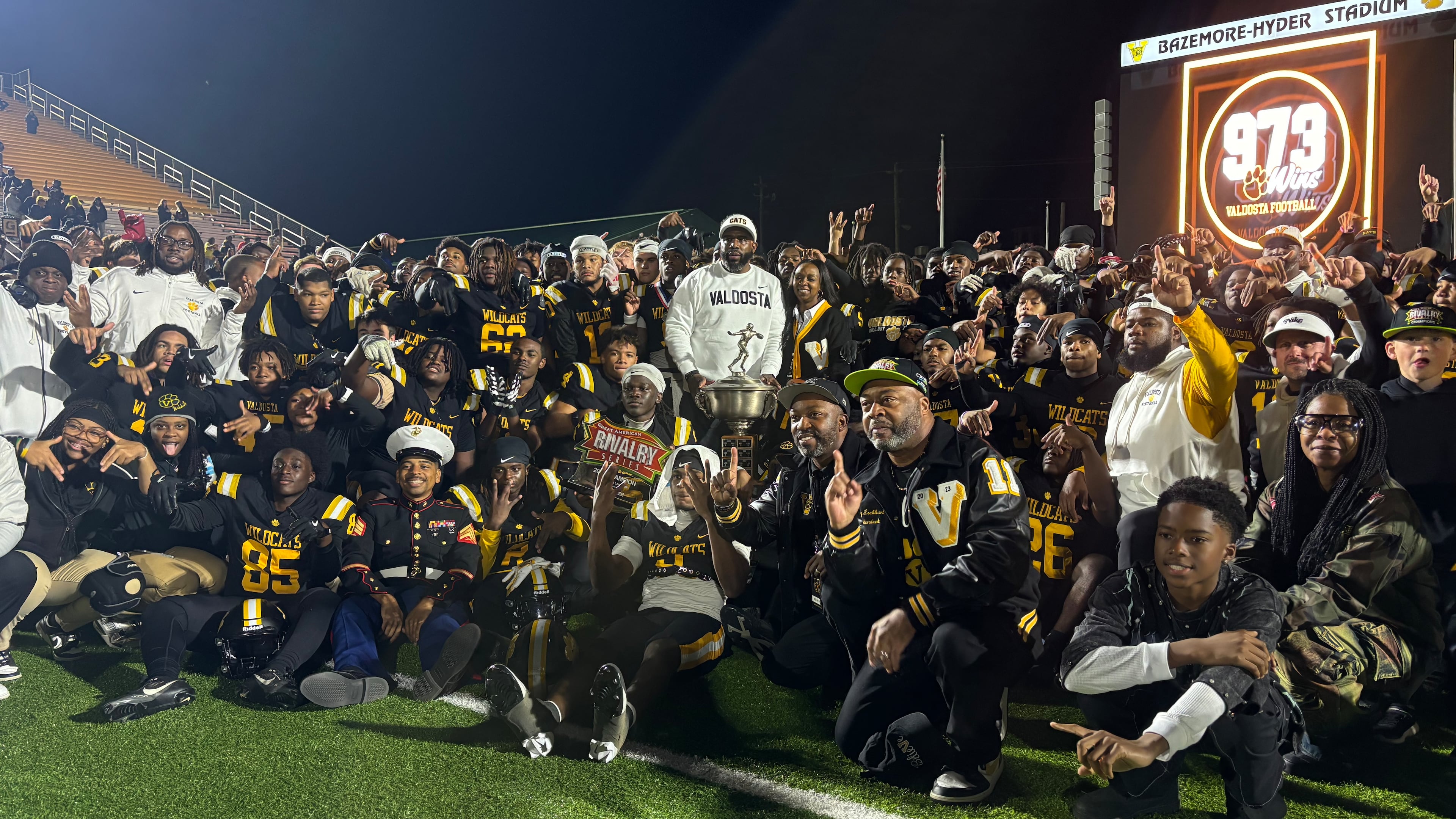 Valdosta celebrates its Region 1-6A championship after a 23-14 defeat of Lowndes in the Winnersville Classic on Friday, Oct. 31, 2025. (Jack Leo/AJC)