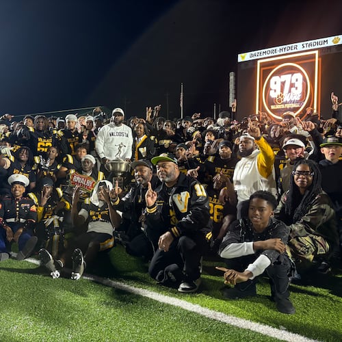 Valdosta celebrates its Region 1-6A championship after a 23-14 defeat of Lowndes in the Winnersville Classic on Friday, Oct. 31, 2025. (Jack Leo/AJC)