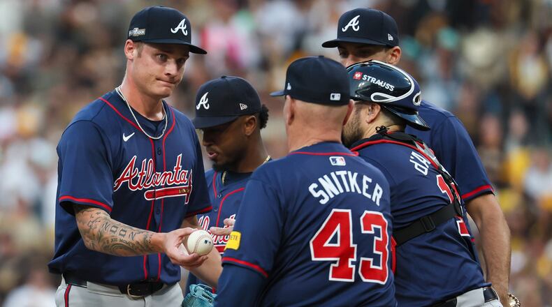 Atlanta Braves pitcher AJ Smith-Shawver is relieved during the second inning of National League Division Series Wild Card Game One against the San Diego Padres at Petco Park in San Diego on Tuesday, Oct. 1, 2024. (Jason Getz / Jason.Getz@ajc.com)