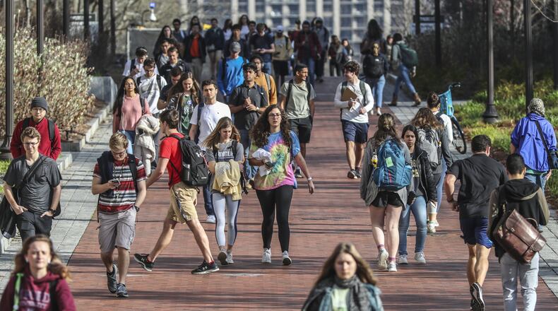 Georgia Tech students were on the move in between classes on campus on Wednesday, March 11, 2020. JOHN SPINK/JSPINK@AJC.COM