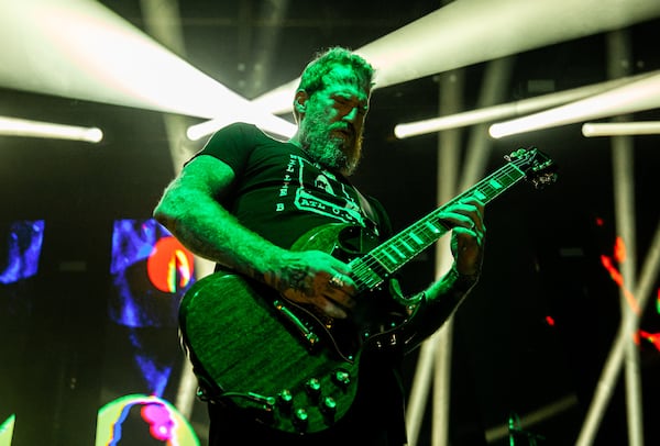 Mastodon's Brent Hinds, pictured here in 2019 during a performance at Atlanta's Coca-Cola Roxy, left the quartet in March 2025. (Ryan Fleisher for the AJC)