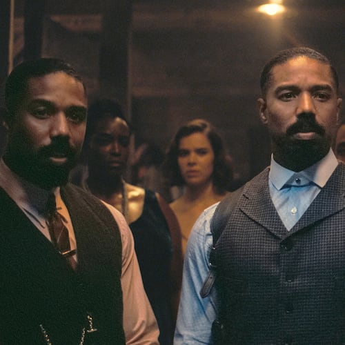 This image released by Warner Bros Pictures shows Michael B. Jordan, foreground from left, Michael B. Jordan and Omar Benson Miller in a scene from "Sinners." (Warner Bros. Pictures via AP)