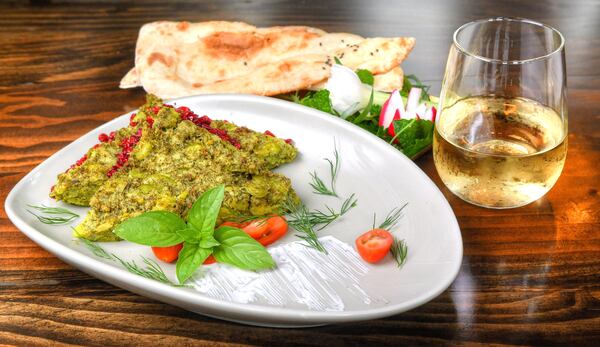 Koko Shevid Baghali (Fava Bean and Dill Frittata) starts with fresh fava beans in the pod. Styling by executive chef Ermiya Rezai. Chris Hunt/FOR THE AJC