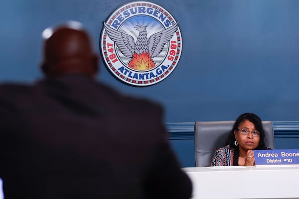 Atlanta city councilmember Andrea Boone listens as Lee Reid, executive director of the Atlanta Citizen Review Board, discusses steps being taken to investigate police use of deadly force to the public safety committee at Atlanta City Hall on Monday, April 28, 2025. (Natrice Miller/AJC)