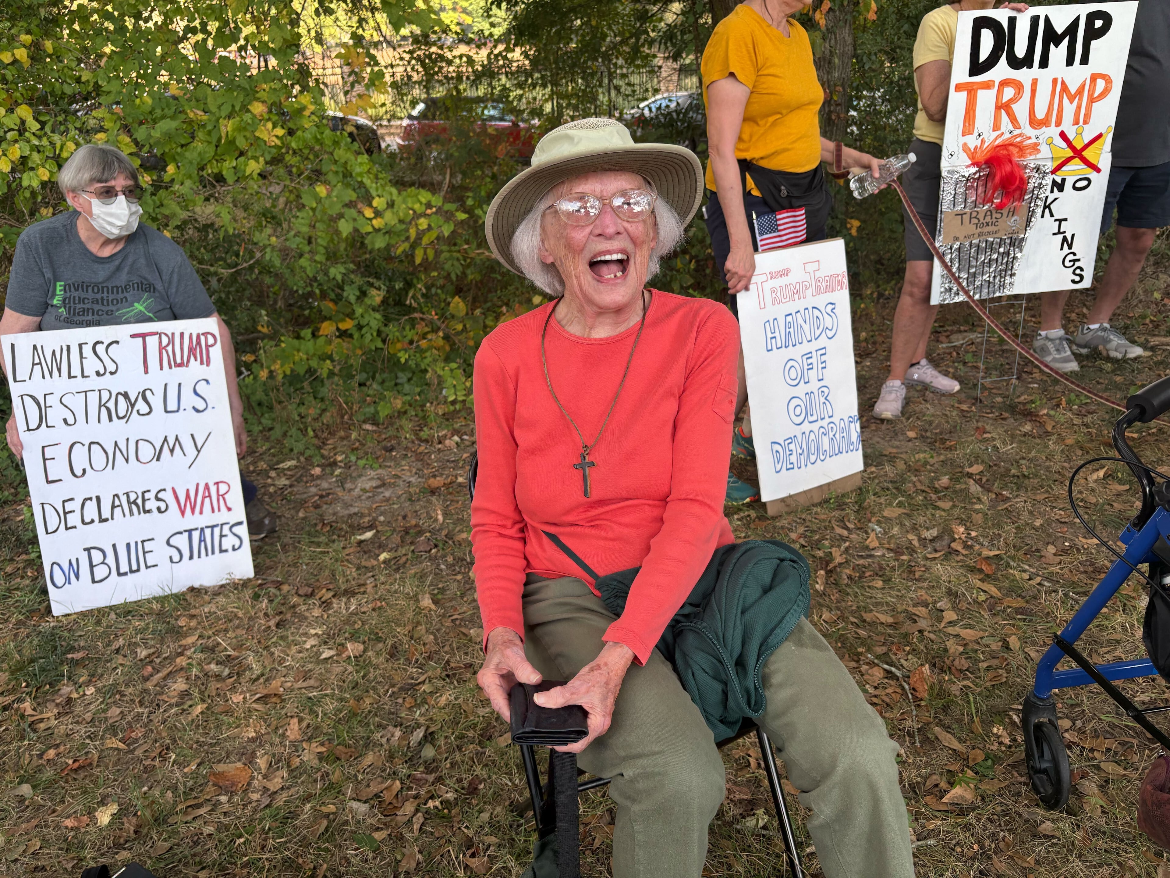 Suzanne Goodell, 102, was among a large group of DeKalb County seniors who lined Clairmont Road on Saturday to protest President Donald Trump and his administration.
(Shaddi Abusaid/AJC)