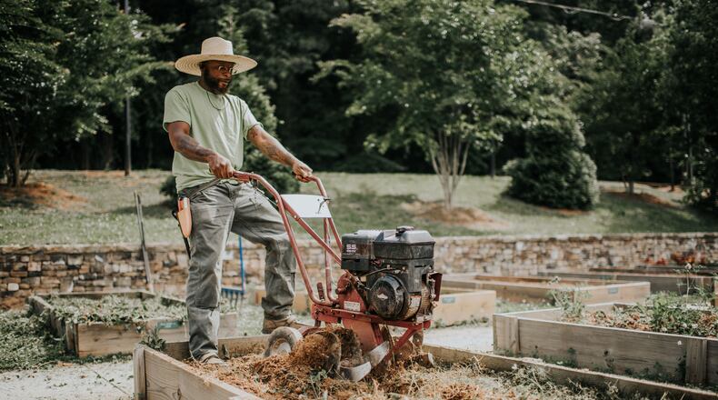During the pandemic, Food Well Alliance has provided thousands of hours of labor support at urban farms, community gardens and school gardens across metro Atlanta. This effort also offered work opportunities for experienced urban farmers, such as Khari Diop. Courtesy of Food Well Alliance
