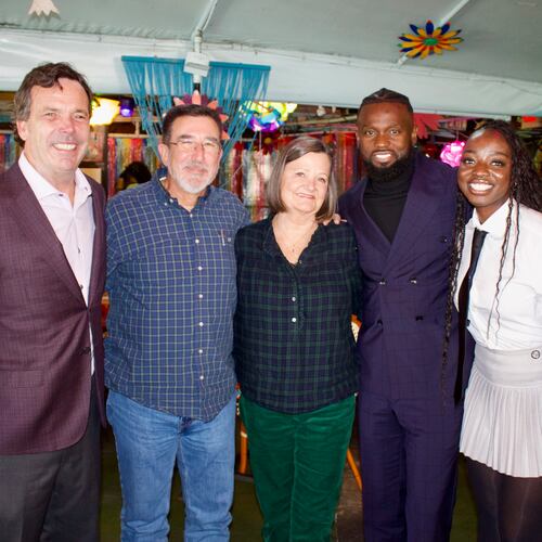 Cliff Oxford (from left), Michael Sheltra, Linay Thomas Sheltra, Amat Baba and Khady Thiam celebrate the sale of R. Thomas Grill at the restaurant. Linay Sheltra sold R. Thomas, the restaurant founded by her father, to Baba's hospitality company, the Teranga Group. (Courtesy of Andrea Fernandez)