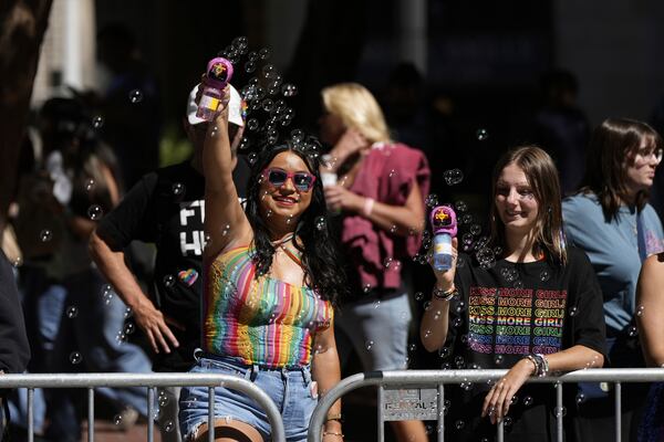 Revelers participate with bubble machines in the Pride Parade, Sunday, June 29, 2025, in San Francisco. (AP Photo/Godofredo A. Vásquez)