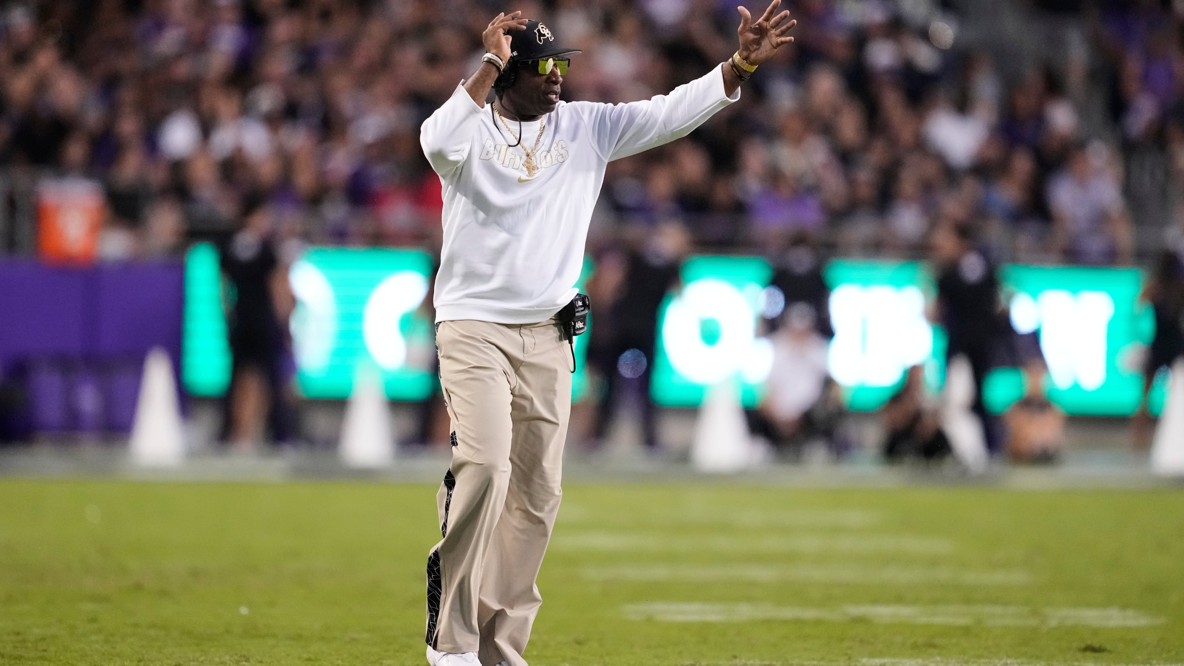 Colorado head coach Deion Sanders calls for a time out in the first half of an NCAA college football game against TCU Saturday, Oct. 4, 2025, in Fort Worth, Texas. (AP Photo/Tony Gutierrez)