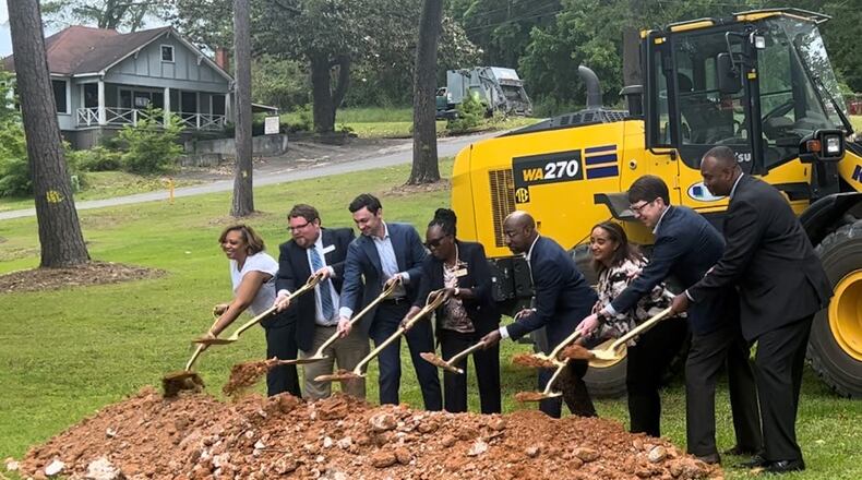 U.S. Sens. Jon Ossoff and Raphael Warnock help local officials in McIntyre break ground on a new sewer system.