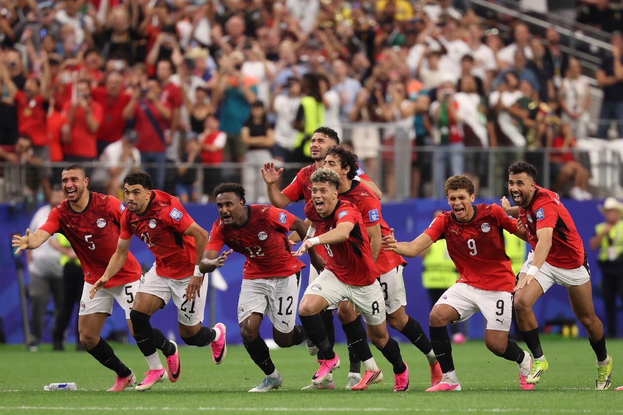 Egypts players celebrate after their teammate Hossam Abdelmaguid scored the winning penalty during World Cup round of 32 soccer match between Australia and Egypt in Arlington, Texas, near Dallas, Friday, July 3, 2026. (Sam Hodde/AP)