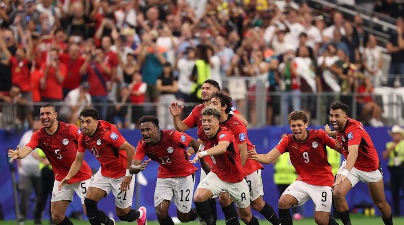 Egypts players celebrate after their teammate Hossam Abdelmaguid scored the winning penalty during World Cup round of 32 soccer match between Australia and Egypt in Arlington, Texas, near Dallas, Friday, July 3, 2026. (Sam Hodde/AP)