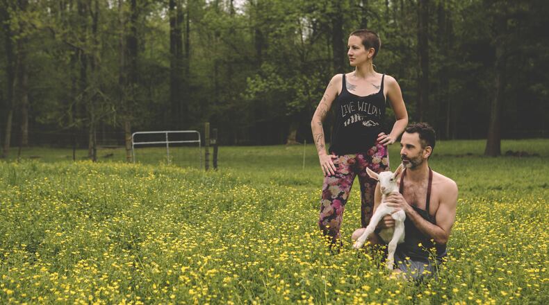 Darby Smith from Sun Dog Farmer in Blairsville and Steven Satterfield of Miller Union in Atlanta appear on the cover of the Farmer Fund calendar.