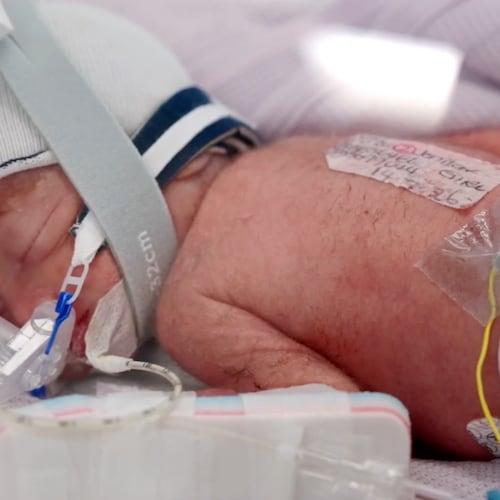 In this image taken from video taken on July 15, 2026, one of the quadruplets born at Metro North Health hospital lies in an incubator in Brisbane, Australia. (Metro North Health via AP)