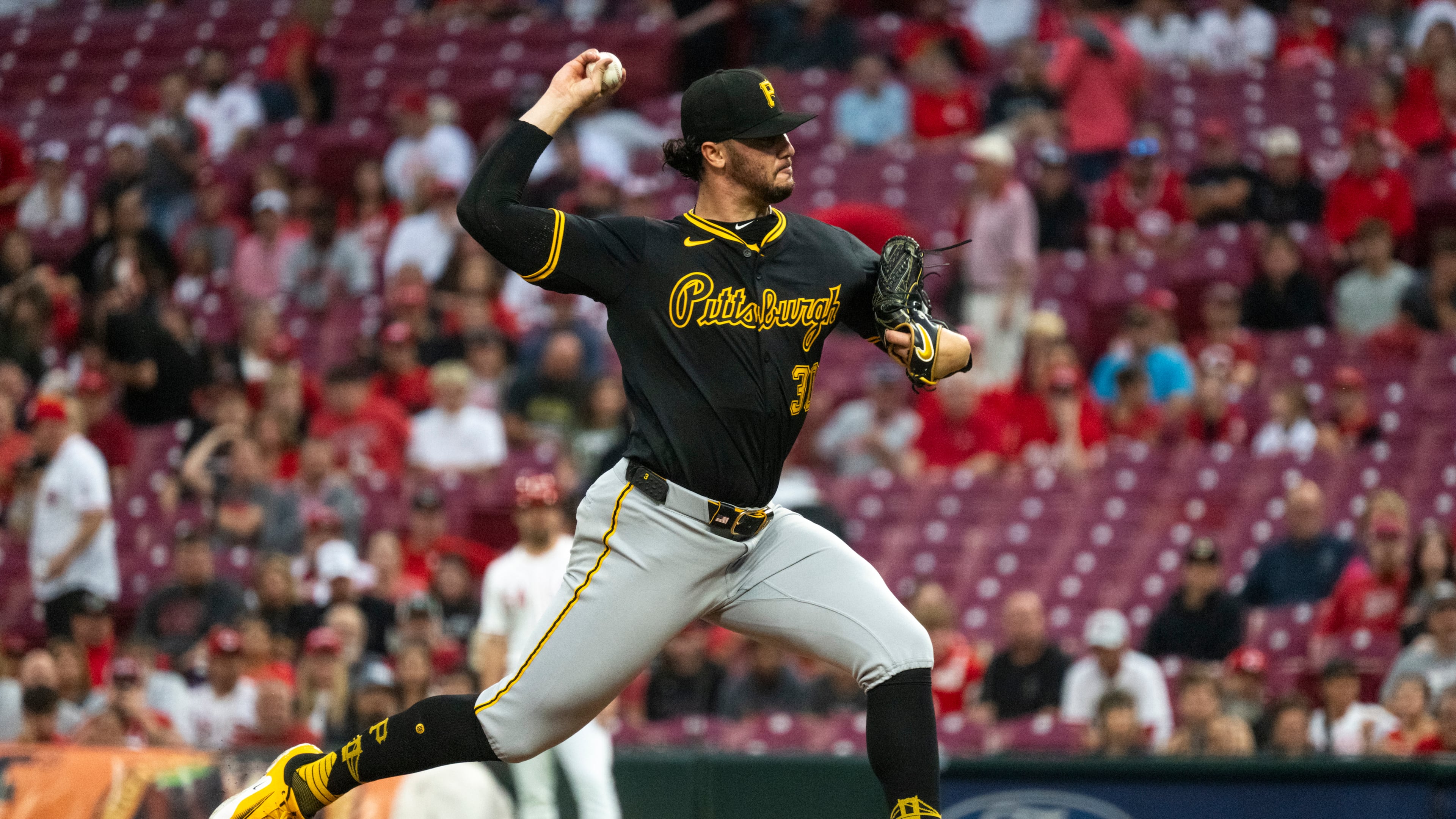 Pittsburgh Pirates pitcher Paul Skenes delivers in the first inning of a baseball game against the Cincinnati Reds, Wednesday, Sept. 24, 2025, in Cincinnati. (AP Photo/Michael Swensen)