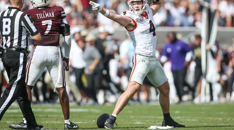 Georgia tight end Oscar Delp (4) reacts after a catch against Mississippi State during the first half of an NCAA college football game in Starkville, Miss., Saturday, Nov. 8, 2025. (AP Photo/James Pugh)