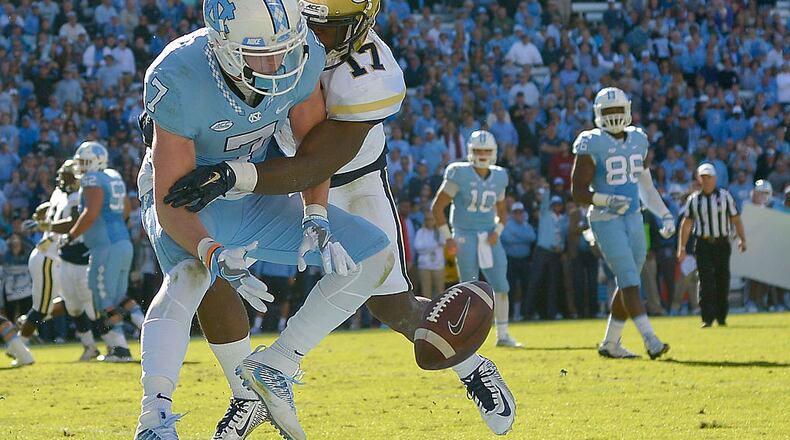 CHAPEL HILL, NC - NOVEMBER 05: Lance Austin #17 of the Georgia Tech Yellow Jackets breaks up a pass in the end zone intended for Austin Proehl #7 of the North Carolina Tar Heels during the game at Kenan Stadium on November 5, 2016 in Chapel Hill, North Carolina. North Carolina won 48-20. (Photo by Grant Halverson/Getty Images)