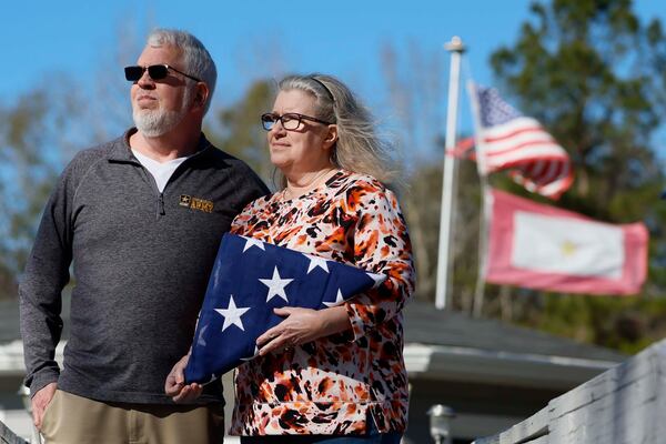 Gary and Mary O’Hara were presented with an American flag at the funeral of their son, Army Staff Sgt. Ryan O’Hara. (Miguel Martinez/AJC)