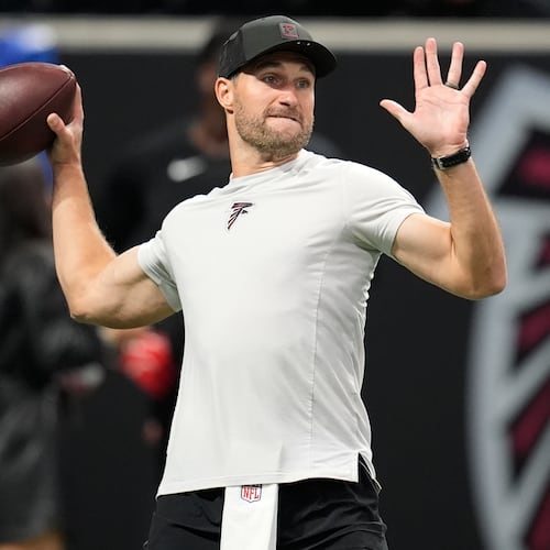 Atlanta Falcons quarterback Kirk Cousins warms up before an NFL football game against the Miami Dolphins, Sunday, Oct. 26, 2025, in Atlanta. (AP Photo/Mike Stewart)