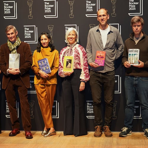 The 6 shortlisted authors pose for photographs during a photocall for the Booker Prize, in London, Sunday, Nov. 9, 2025. (AP Photo/Alberto Pezzali)