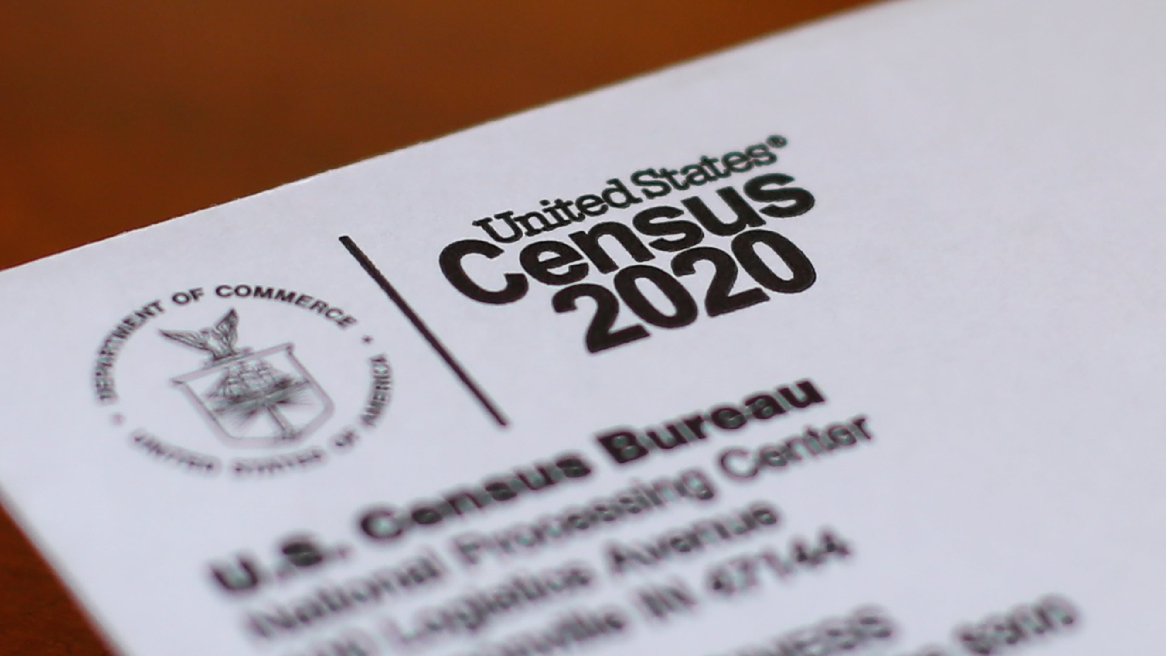 FILE - An envelope containing a 2020 census form mailed to a U.S. resident is seen in Detroit, on April 5, 2020. (AP Photo/Paul Sancya, File)