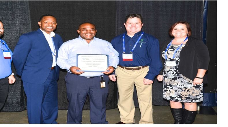 DeKalb County Watershed Management receives two awards. Pictured from left, Jesse LeBoeuf (Cobb County Water System), DWM Collections Systems Committee Chair, Orthelus T. Perdue, Edgar Smith, Darren Eastall, and Heather Veal (Macon Water Authority). CONTRIBUTED