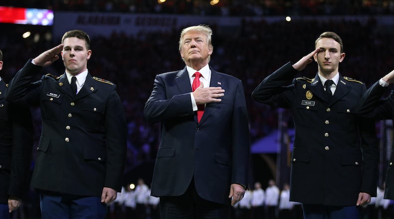 January 8, 2018 Atlanta: President Donald Trump participates in the National Anthem at the College Football Playoff National Championship on Monday, January 8, 2018, in Atlanta.    Curtis Compton/ccompton@ajc.com