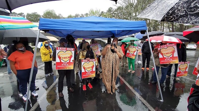Supporters of the South DeKalb YMCA gather during a rally decrying its temporary closure on Thursday, March 31, 2021. SPECIAL PHOTO
