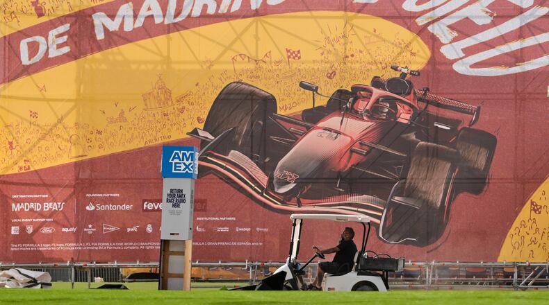 A man drives a golf cart inside the Spanish Grand Prix circuit in Madrid, Spain, Tuesday, Sept. 8, 2026. (AP Photo/Bernat Armangue)