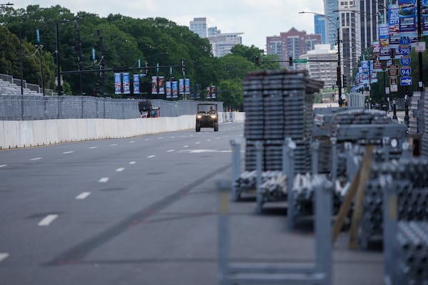 Construction of the street course continues ahead of the NASCAR auto racs, Friday, June 27, 2025, in downtown Chicago. (AP Photo/Erin Hooley)